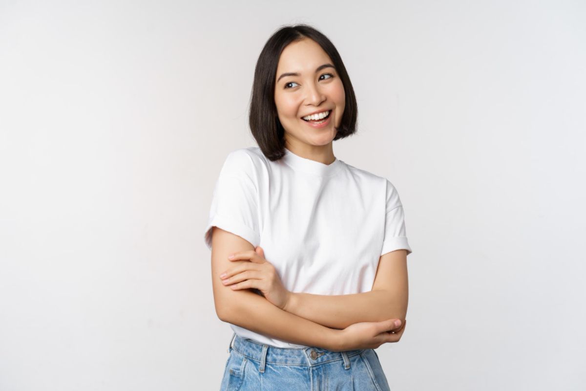 Portrait Happy Asian Woman Smiling Posing Confident Cross Arms Chest Standing Against Studio Background